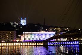 Standing on the Saône River, you can take in a stunning light show, and stop by one of the delicious nearby Lyonnaise food stands